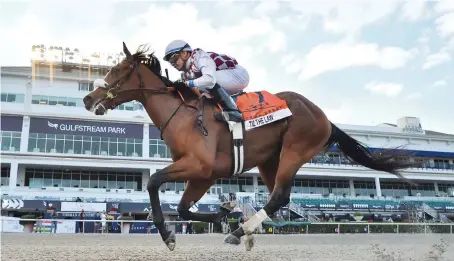  ?? AP ?? Tiz the Law, riddren by Manuel Franco, wins the Florida Derby horse race at Gulfstream Park on Saturday in Hallandale, Beach, Fla.