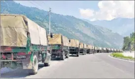  ??  ?? Army vehicles move towards Ladakh on the Manali-leh highway on June 28.
