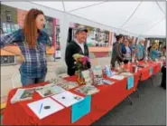  ?? LISA MITCHELL — DIGITAL FIRST MEDIA ?? Local authors showcase their books at the 2017 Author Pavilion. The 5th Annual Author Pavilion will be hosted by Firefly Bookstore during the Kutztown Block Party on April 29. New and returning local authors will share new titles and their journey to...