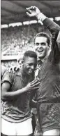  ?? AP ?? Brazil’s Pele (left) celebrates with goalkeeper Gilmar Dos Santos Neves after beating Sweden in the 1958 World Cup final.