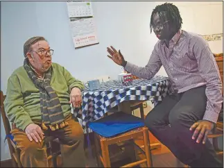  ??  ?? Diouf (right) gestures during a visit with his adoptive father Juan Gil, 74, in the basque city of Algorta, Spain.