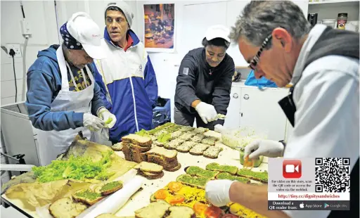  ?? PICTURE: CINDY WAXA ?? DELICIOUS HEALTHY FOOD: Francois Coetsee, programme co-ordinator, right, at The Carpenter’s Shop in Roeland Street, making sandwiches which will be sold to the Independen­t Staff. From left are Theresa Solomons, Danny Oosthuizen and Razaan Lucas.