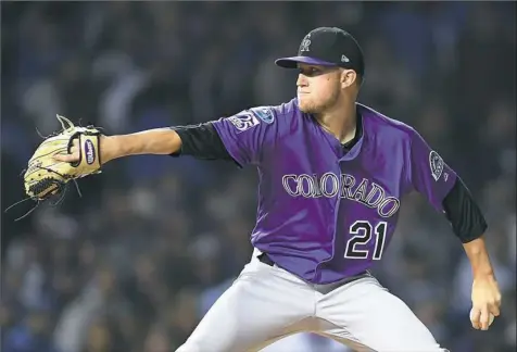  ?? Stacy Revere/Getty Images ?? Colorado starting pitcher Kyle Freeland was dominant early in the National League wild-card game against the Cubs Tuesday night in Chicago. ON THE WEB: The game ended too late for this edition. For coverage, go to post-gazette.com.