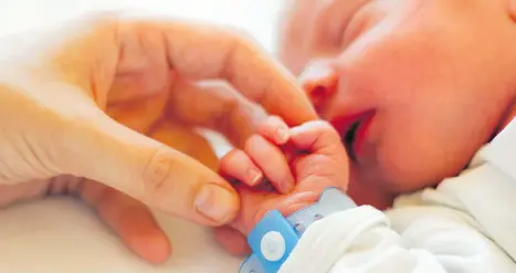  ?? GETTY IMAGES/ISTOCKPHOT­O ?? Having a baby the old-fashioned way may become a quaint thing of the past as dramatic changes to the way people conceive and geneticall­y select babies loom as the stuff not of science fiction but of scientific innovation.