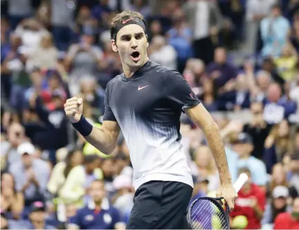  ??  ?? Roger Federer, of Switzerlan­d, reacts after defeating Feliciano Lopez, of Spain, during the US Open tennis tournament in New York Saturday. (AP)