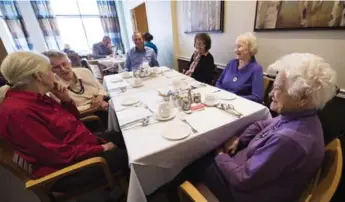 ?? NATHAN DENETTE/THE CANADIAN PRESS ?? Ada Garrison, second from left, is part of the growing group of elderly Canadian women redefining aging alone.