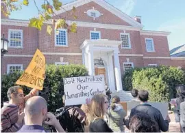  ?? ALGERINA PERNA/BALTIMORE SUN ?? Johns Hopkins University humanities students and others hold a protest against the possible closing of the Humanities Center.
