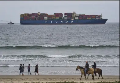  ?? (AP) ?? A cargo ship arrives at the port at Ensenada, Mexico, before the arrival of Hurricane Hilary in August.