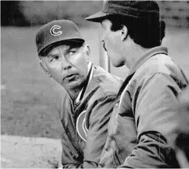  ??  ?? Cubs manager Gene Michael talks with coach John Vukovich in 1986. | SUN- TIMES