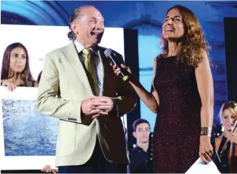  ?? Photo: Massimo Assenza - Pozzallo) ?? Journalist Enrica Simonetti interviews Wilfred Sultana after announcing his Trofeo del Mare 2017 recognitio­n