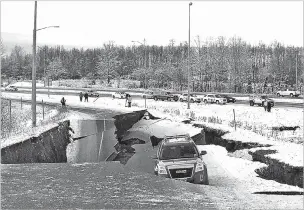  ?? DAN JOLING/ASSOCIATED PRESS ?? A car is trapped on a collapsed section of an off-ramp in Anchorage on Friday after back-toback earthquake­s measuring 7.0 and 5.7 rocked buildings and buckled roads. People ran from their offices or sought shelter under office desks, while a tsunami warning had some seeking higher ground.