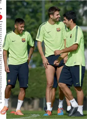  ?? — AFP ?? Barcelona’s Neymar, Gerard Pique and Luis Suarez share a light moment at a training session at the team’s facility in St Joan Despi on Monday, the eve of their Uefa Champions League Group F match against Ajax Amsterdam.