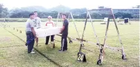  ??  ?? Some of Sabah’s SUKMA archers chipped in with the preparatio­n works for the Sabah State Archery Carnival, which is happening at the archery range in Likas this weekend.