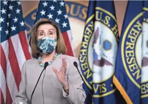  ?? ANGERER/GETTY IMAGES/TNS DREW ?? Speaker Nancy Pelosi has recalled House lawmakers to Washington for a vote Monday with a roll call that would put all members on record as supporting or rejecting $2,000 stimulus checks proposed by President Donald Trump.