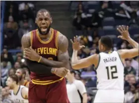  ?? MORRY GASH — THE ASSOCIATED PRESS FILE ?? In this file photo, Cleveland Cavaliers’ LeBron James reacts to no call being called on his shot during the second half of a game against the Milwaukee Bucks in Milwaukee. On Tuesday, James was chosen as The Associated Press 2016 Male Athlete of the...