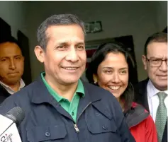  ??  ?? Humala and Heredia leave the Nationalis­t Party headquarte­rs in Lima on July 13 last year. — Reuters photo