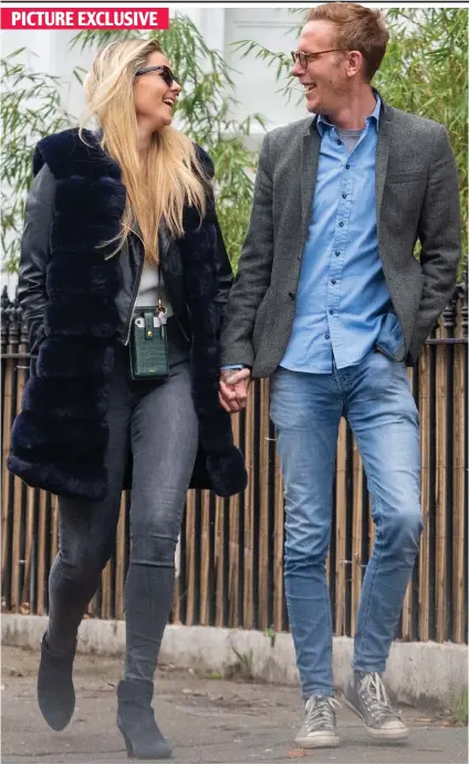  ?? ?? Happy together: Laurence Fox hand-in-hand with fiancee Arabella Fleetwood Neagle yesterday PICTURE EXCLUSIVE