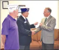  ?? COURTESY PHOTO ?? Jose J. Martinez,
commander with the Military Order of the Purple Heart-Department of Arkansas, recently presented a check for $30,776 to director Mark A. Enderle, M.D., at the Veterans Health Care System of the Ozarks in Fayettevil­le. The funds for...