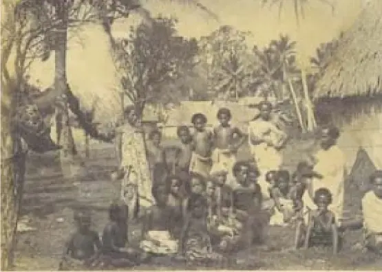  ?? Picture: ALEXANDER TURNBULL LIBRARY. ?? A group of Tongan and Fijian men, women and children photograph­ed in the 1800s by a crew member from the HMS Espiegle.
