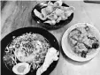  ??  ?? Nasi Kerabu with Ayam Percik and Fish Cracker.