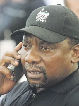  ?? Picture: AFP ?? NEGOTIATIN­G SKILLS. Cyril Ramaphosa on the phone in this file picture from 2002.