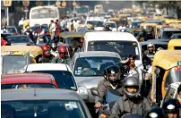  ?? — Bloomberg ?? A view of the traffic during rush hour in Bangalore.