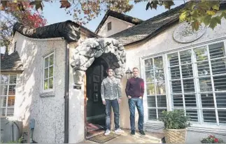  ?? Mel Melcon Los Angeles Times ?? TOM BALAMACI, left, and Patrick Wildnauer balanced quality with savvy spending as they reenvision­ed their 1927 cottage in Wilshire Vista. They worked with interior designer Amalia Gal.