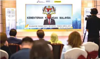  ?? — Bernama photo ?? Tengku Zafrul delivers his keynote address during Invest Malaysia 2020.