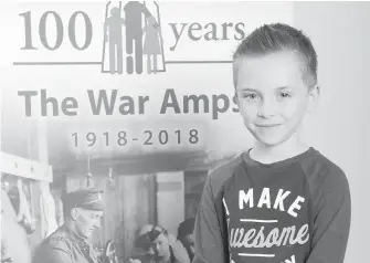  ??  ?? Lincoln Davis, 7, of Victoria recently returned from the 2018 B.C. Child Amputee seminar, which helped mark the 100th anniversar­y of the War Amps by bringing together child amputees from across B.C.