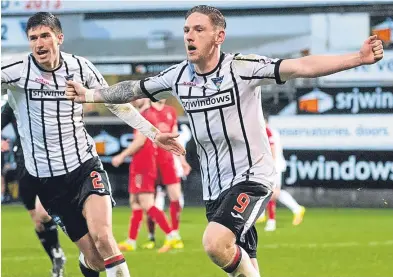  ??  ?? Declan Mcmanus celebrates scoring against Falkirk earlier this year. Picture: SNS.