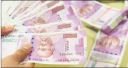  ?? MINT ?? The rupee on Friday slipped 1 paisa to close at its all-time low of 78.33 (provisiona­l) against the US dollar.