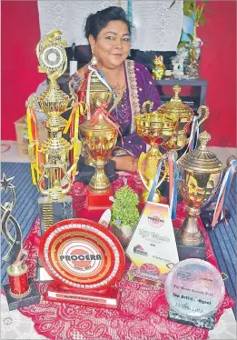  ?? Picture: ATU RASEA ?? Madhu Lata Singh displays the awards she has received during her musical career at her home in Waila 3B in Davuilevu, Nausori.