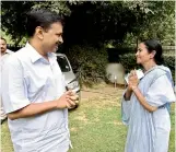  ?? — PTI ?? West Bengal CM Mamata Banerjee meets Delhi CM Arvind Kejriwal in New Delhi on Wednesday.