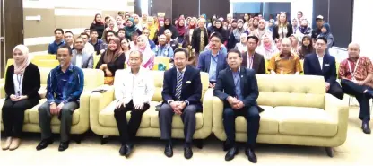  ??  ?? Naroden (front centre) is seen in a group photo with SEDC staff, guests, and seminar participan­ts. SEDC general manager Abdul Hadi Abdul Kadir is at front second right.