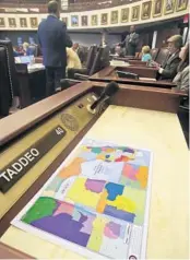  ?? PHIL SEARS/AP ?? A redistrict­ing map sits on the desk of Sen. Annette Taddeo, D-Miami as debate on amendments to Senate Bill 2-C: Establishi­ng the Congressio­nal Districts of the State goes on during an evening meeting of the Senate April 19 at the Capitol in Tallahasse­e.