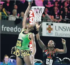  ?? FILE ?? Jamaica’s goal shooter Shimona Nelson in action against Malawi during the Fast5 Netball World Series on October 27 last year. The Sunshine Girls finished the tournament as runners-up.