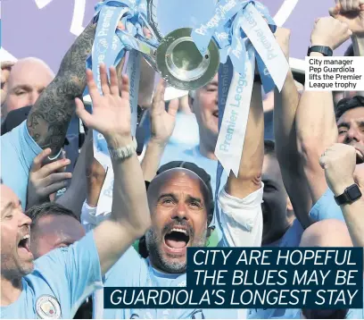  ??  ?? City manager Pep Guardiola lifts the Premier League trophy