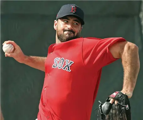  ?? MATT STONE / HERALD STAFF ?? ‘STILL PITCHING’: Red Sox reliever Brandon Workman could likely be the team’s go-to arm in the ninth inning.