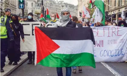  ?? Vuk Valcic/Zuma Press/Shuttersto­ck ?? Pro-Palestine protesters at Oxford Circus on 4 November. There have been calls from some people to ban Saturday’s march. Photograph: