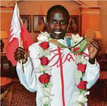  ?? BNA ?? Ruth Jebet is felicitate­d after she arrives in Bahrain following her achievemen­ts in Rio and Paris.