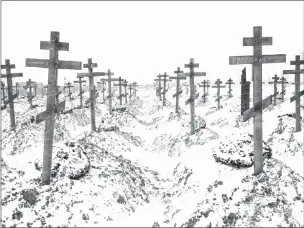  ?? NEW YORK TIMES FILE PHOTO ?? Graves of dead Wagner fighters in Bakinskaya, Russia, in February. Tens of thousands of Russian prison inmates volunteere­d for combat duty in Ukraine under the mercenary group’s banner, easing pressure on Russian President Vladimir Putin to institute unpopular drafts.