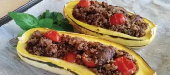  ?? CYNTHIA DAVID ?? Quinoa and ground pork make a tasty stuffing for the easy-to-prepare delicata squash. You can even eat the skin.