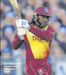  ?? REUTERS ?? Chris Gayle hit the milestone in his 52nd game.
