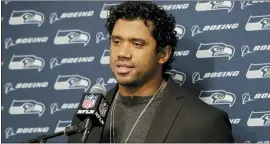  ??  ?? In this Dec. 8, 2019, file photo, Seattle Seahawks quarterbac­k Russell Wilson speaks during a news conference.