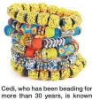  ??  ?? Cedi, who has been beading for more than 30 years, is known for creating beads out of mostly recycled glass. He travels the world sharing Ghana’s traditiona­l style of beading and has a workshop where internatio­nal tourists visit to learn the craft.