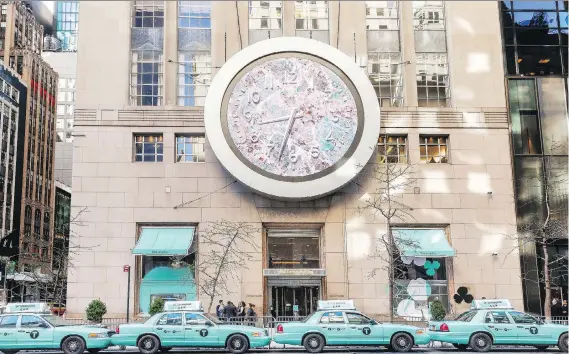  ?? PHOTOS: TIFFANY & CO. ?? Tiffany Blue taxis line Fifth Avenue in front of Tiffany & Co.’s flagship New York City store as the 181-year-old luxury jewelry brand launches its new line.