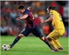  ??  ?? Cillian Sheridan challenges Lionel Messi in a 2014 Champions League match. GETTY IMAGES