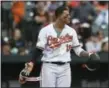  ?? GAIL BURTON — THE ASSOCIATED PRESS ?? The Orioles Manny Machado looks to the mound after a pitch was thrown near his head by Matt Barnes in the eighth inning Sunday.