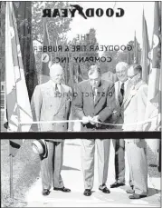  ?? BARNEY SELLERS/THE COMMERCIAL APPEAL FILES ?? Col. Roane Waring (second left), president of the Memphis Chamber of Commerce, cut the ribbon on June 3, 1953, to officially open the Goodyear Tire and Rubber Co. district office and warehouse at 2070 South Third Street. Participat­ing in the formal...