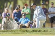  ?? AP photo ?? Adam Schenk hits out of the bunker on the fourth hole during the second round of the Valspar Championsh­ip on Friday.
